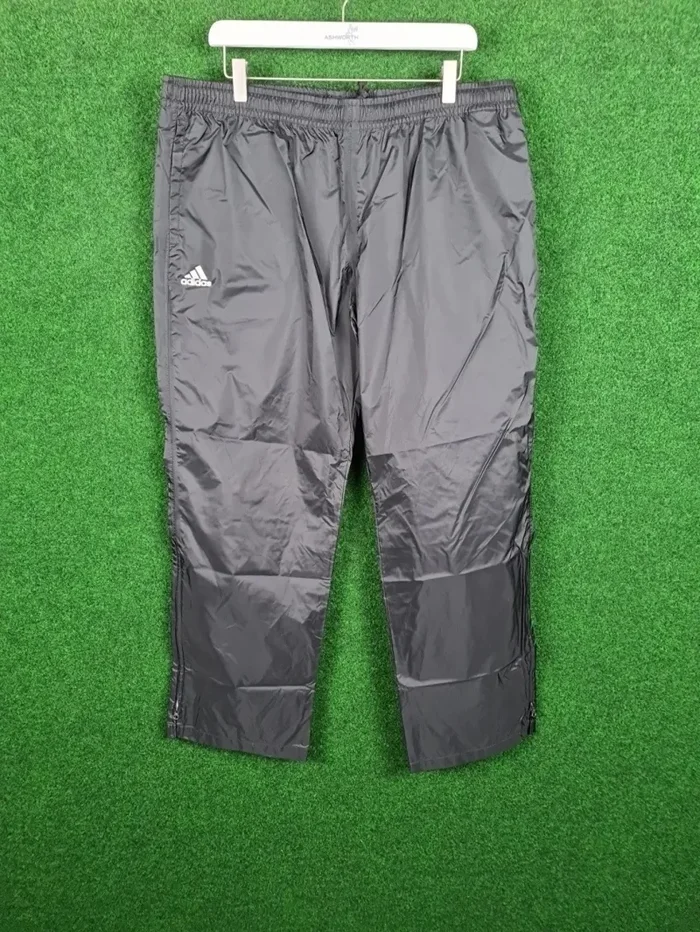 ADIDAS leichte Regenhose – Damen (Schwarz, L, Packable, 100% Polyamid)